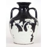 A LATE 19th CENTURY WEDGEWOOD BLACK JASPER PORTLAND VASE with applied classical figures to the