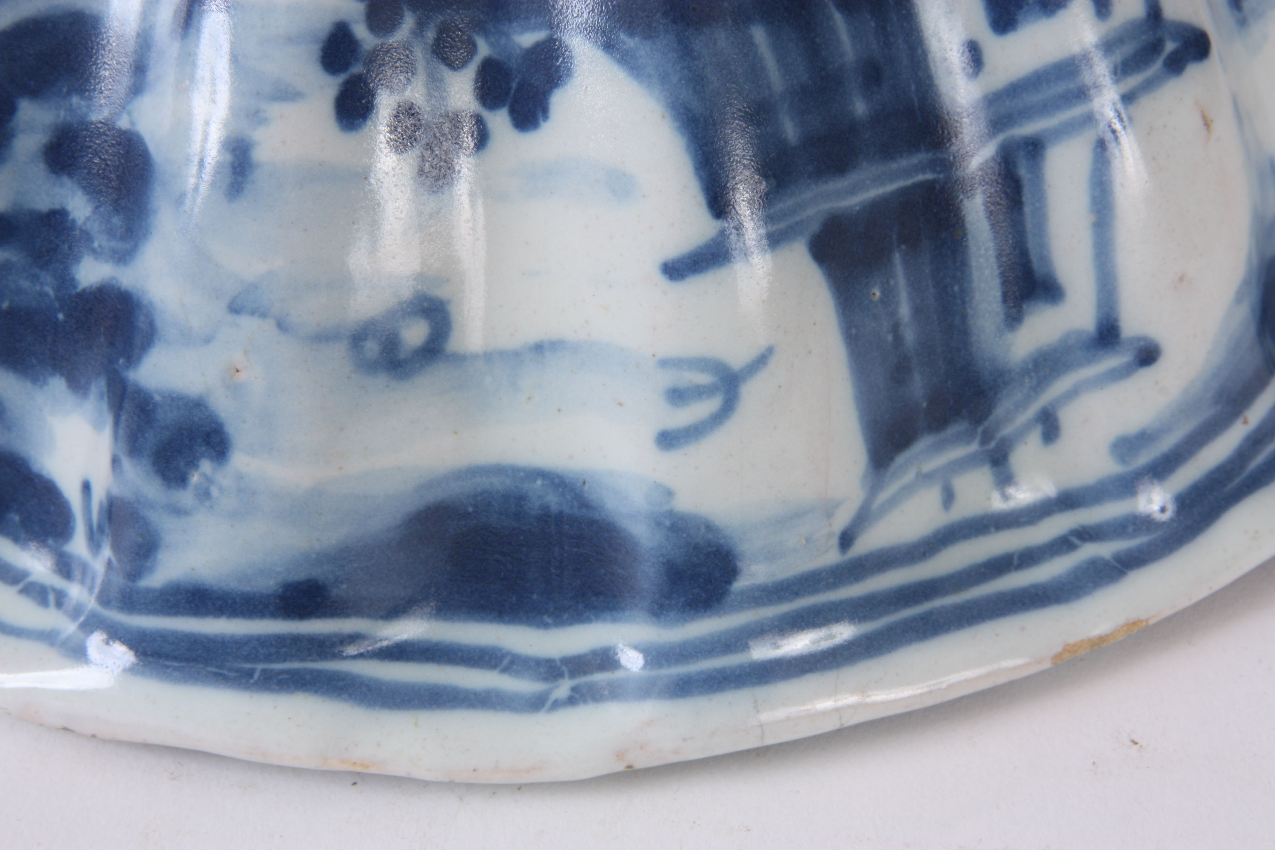 A 19TH CENTURY BLUE AND WHITE ITALIAN FAIENCE POTTERY  BOWL of reeded shaped form decorated with - Image 6 of 7
