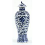 A 19TH CENTURY CHINESE BLUE AND WHITE TAPERING LIDDED VASE with leaf-work and flowerhead