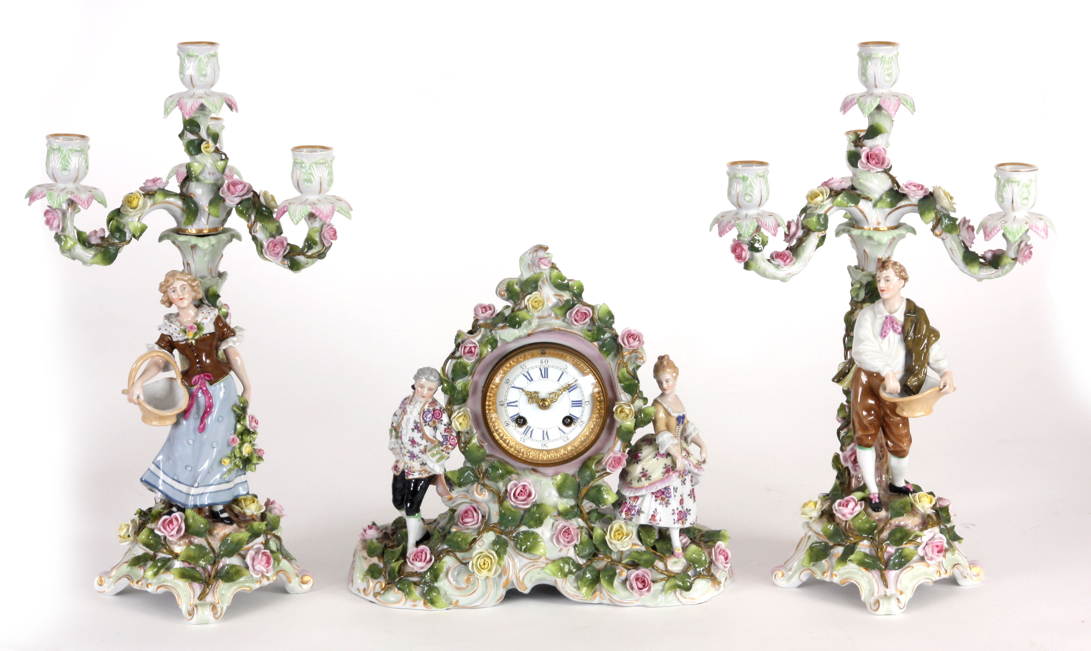 A LATE 19th CENTURY SCHIERHOLZ PORCELAIN CLOCK GARNITURE  with classical figures and applied rose