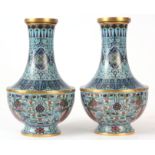A PAIR OF LATE 19TH CENTURY CLOISONNE CHINESE VASES finely decorated with dragons and floral