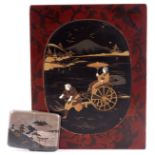 A JAPANESE SILVER CIGARETTE CASE decorated with Nielo bronzed scenes of mountains and temples -