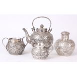 A 19th CENTURY SILVER CHINESE FOUR PIECE TEA SET comprising of a teapot, sugar bowl, cream jug and