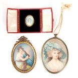 A COLLECTION OF THREE MINIATURE PORTRAITS one in red leather case on ivory, one in gilt brass on