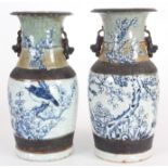 A PAIR OF 19th CENTURY CHINESE CRACKLE GLAZE BLUE AND WHITE VASES of baluster form with blossom