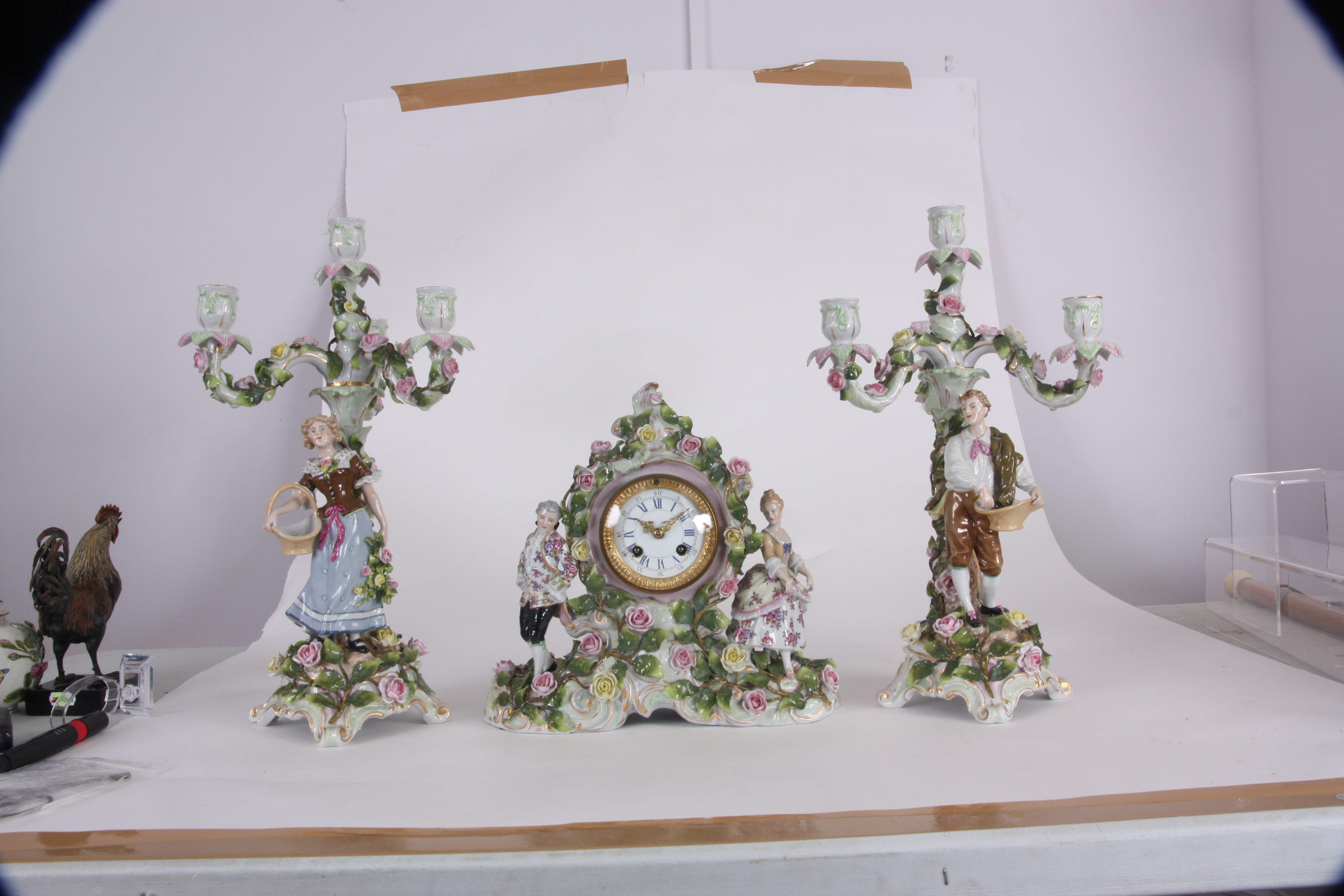 A LATE 19th CENTURY SCHIERHOLZ PORCELAIN CLOCK GARNITURE  with classical figures and applied rose - Image 3 of 4