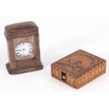 TWO WATCH HOLDERS one Moroccan leather carriage clock type case 7cm high, the other boxwood