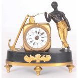A FRENCH BRONZE AND ORMOLU BLACKAMORE MANTLE CLOCK the man holding the anchor line leaning against a