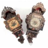 TWO 18th CENTURY STYLE DUTCH WALL CLOCKS with weight driven movements and painted dials, one with