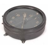 AN EARLY 20th CENTURY WALL MOUNTED GRAVITY CLOCK with black metal case enclosing a 7” dial with