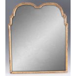 AN EARLY 18TH CENTURY QUEEN ANNE GILT GESSO HANGING MIRROR the moulded frame with stepped sides