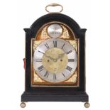 SAM HOLBIN, BITTON. A GEORGE III AND LATER EBONISED BRACKET CLOCK the break arch case surmounted