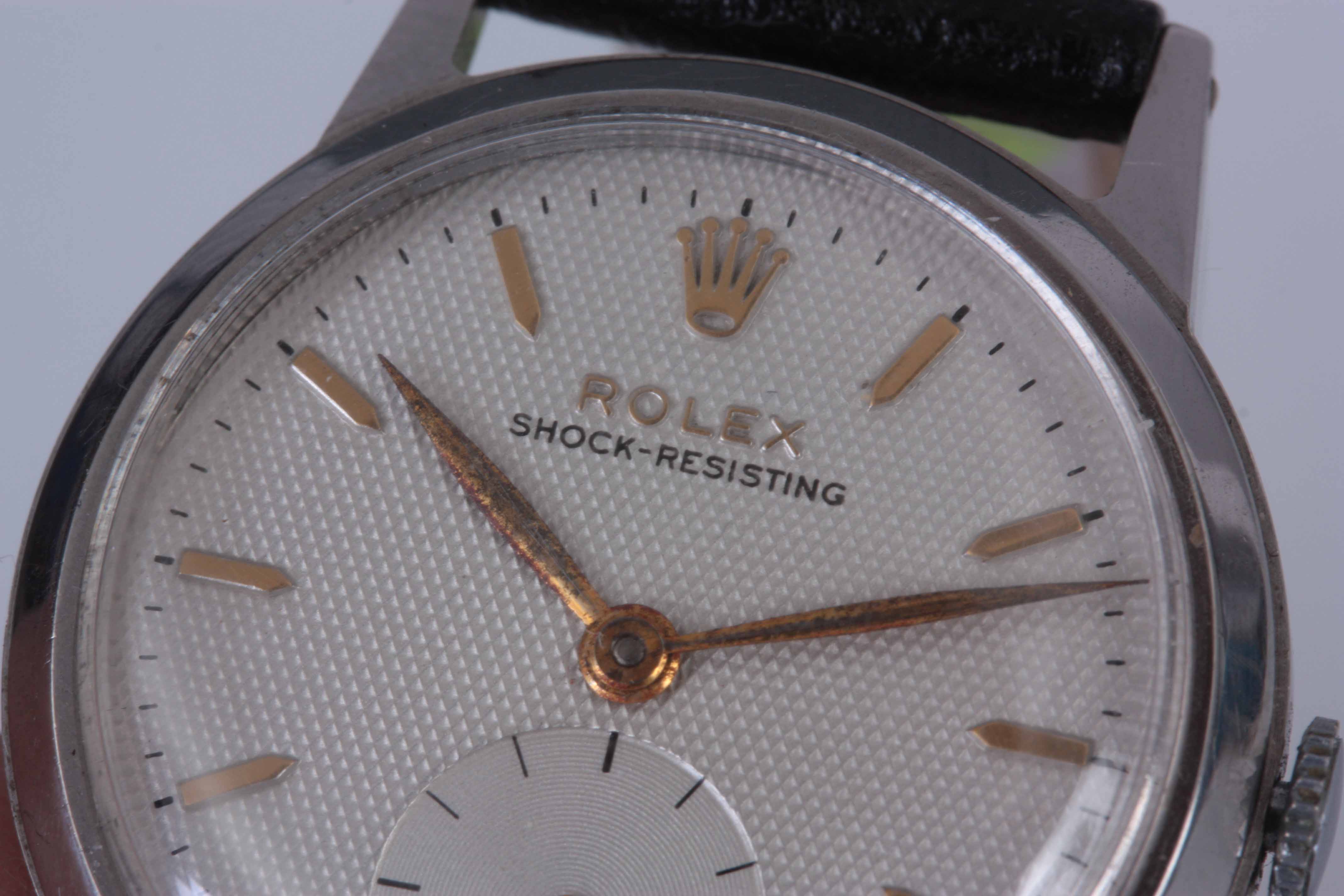 A GENTLEMAN'S 1950's STEEL ROLEX WRIST WATCH with smooth bezel enclosing a silvered honeycomb dial - Image 6 of 8