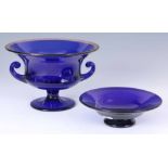 A 19TH CENTURY BRISTOL BLUE LARGE TWO HANDLED PEDESTAL BOWL the ogee shaped body with a finely