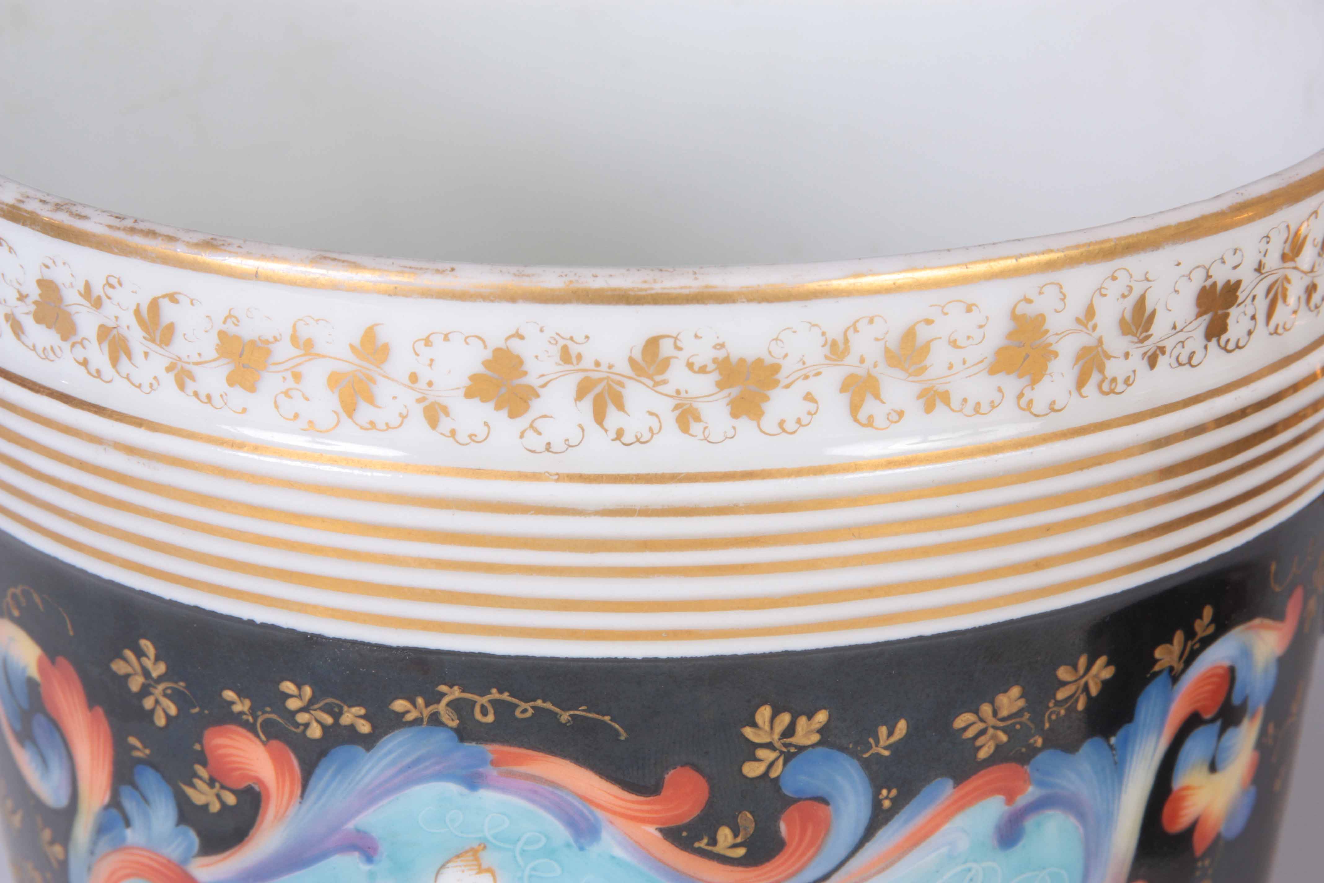 A PAIR OF 19TH CENTURY PARIS PORCELAIN ICE PAILS decorated with flowers with gilt lions mask handles - Image 6 of 7