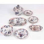 A 19TH CENTURY TOMQUIN IRONSTONE CHINA PART DINNER SERVICE with colourful floral and branch work