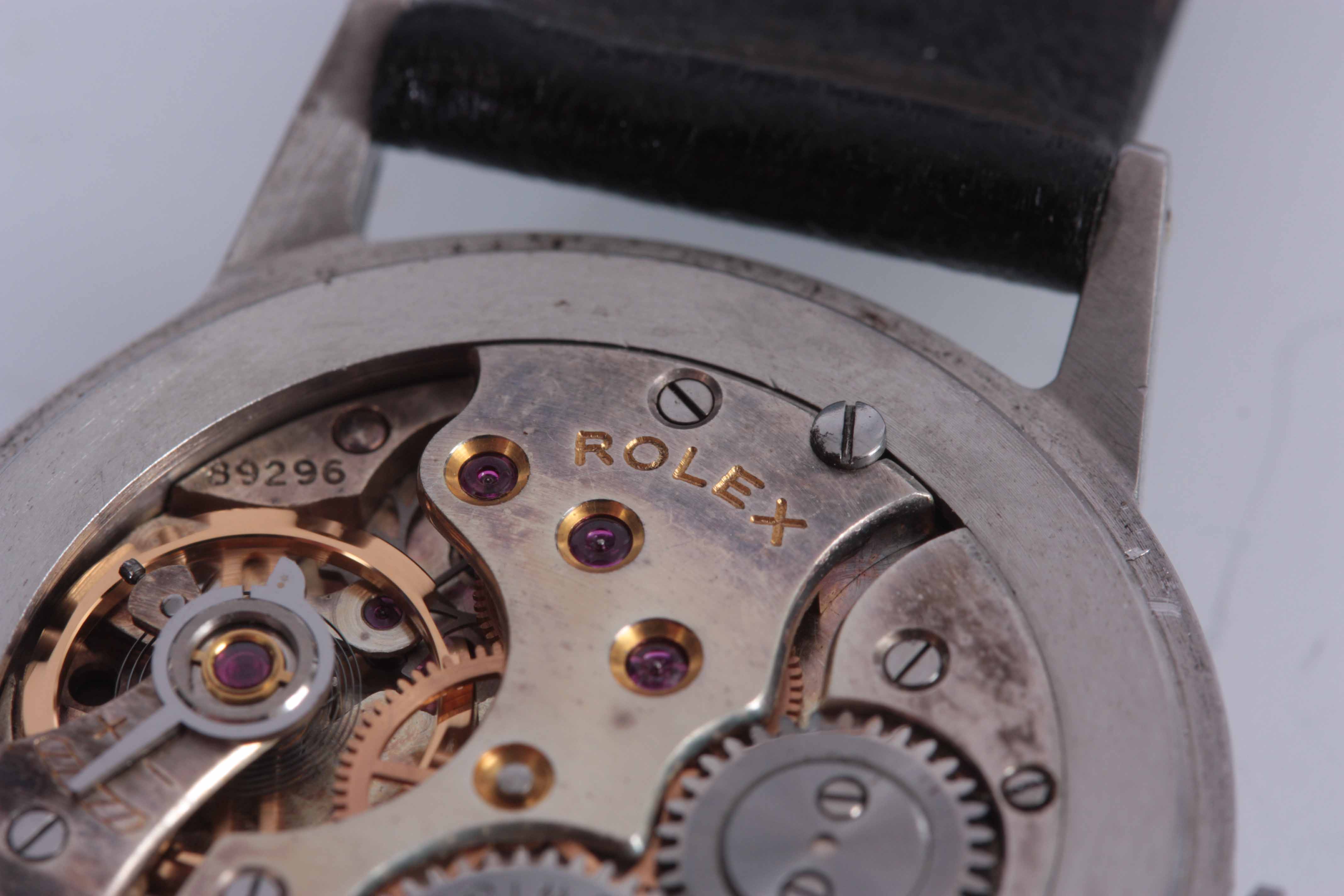 A GENTLEMAN'S 1950's STEEL ROLEX WRIST WATCH with smooth bezel enclosing a silvered honeycomb dial - Image 5 of 8