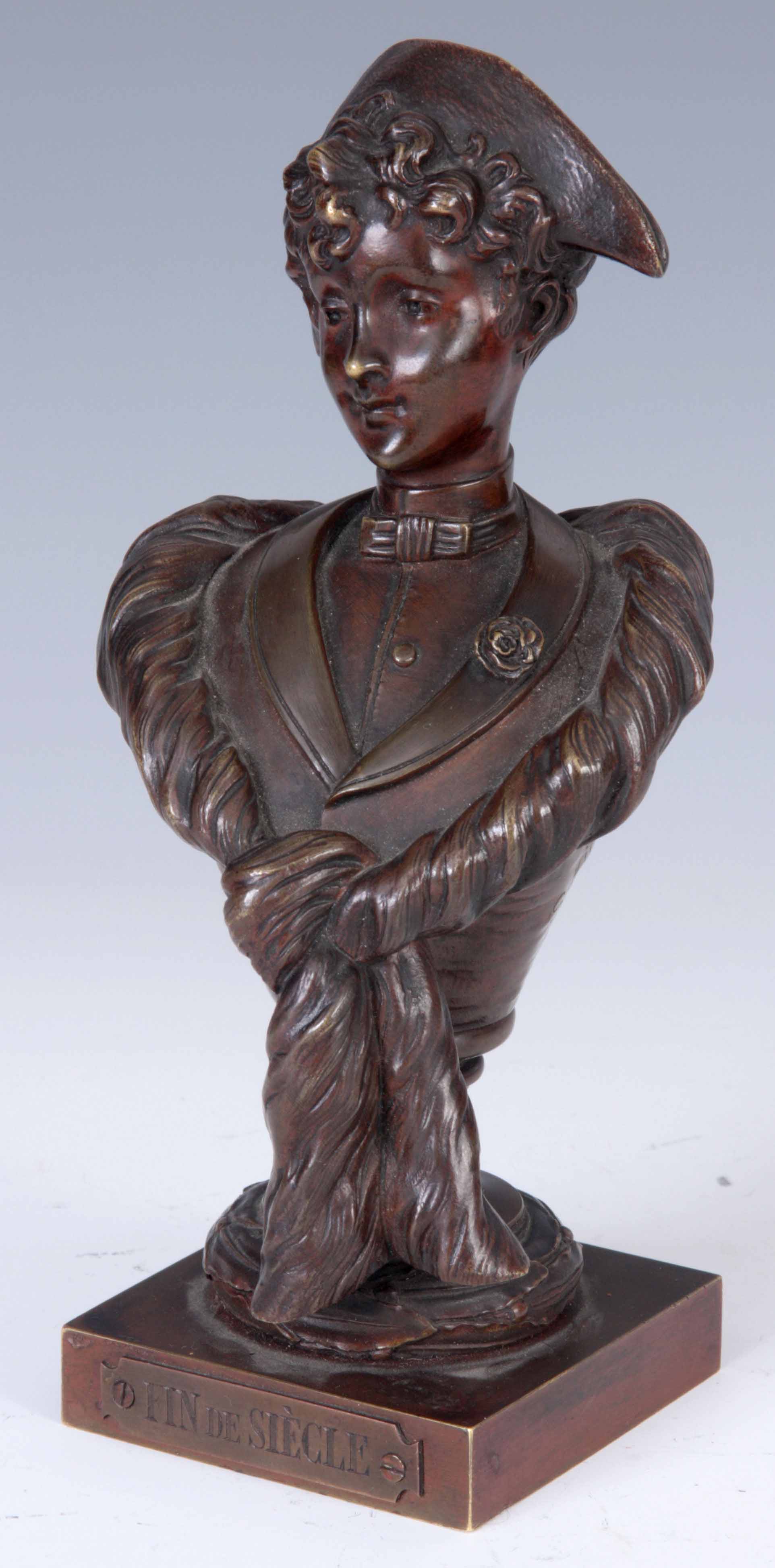 S. KINSBURGERA. LATE 19th CENTURY FRENCH PATINATED BRONZE BUST modelled as a boy on socle with