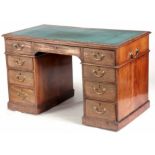 A GEORGE III FREE STANDING MAHOGANY TWIN PEDESTAL KNEEHOLE DESK the former hinged tooled leather top