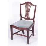 A GEORGE III HEPPLEWHITE DESIGN MAHOGANY SIDE CHAIR with moulded shield shaped back enclosing a