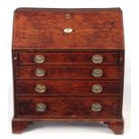 A MID 18TH BURR ELM BUREAU with hinged angle fall revealing a fitted interior of pigeon holes and