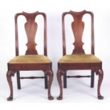 A PAIR OF GEORGE I WALNUT SIDE CHAIRS with scrollwork dished top rails and solid vase-shaped