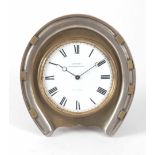 A LATE 19th CENTURY FRENCH DESK CLOCK the brass and nickle plated case formed as a horseshoe