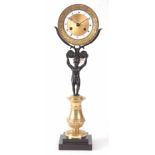 AN EARLY 19th CENTURY FRENCH BRONZE AND ORMOLU FIGURAL MANTEL CLOCK formed as a patinated bronze