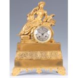 A MID 19th CENTURY FRENCH ORMOLU FIGURAL MANTEL CLOCK modelled as a lady in Eastern dress seated