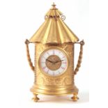 A LATE 19th CENTURY FRENCH GILT BRASS NIGHT CLOCK the case formed as a beehive with fine engraved