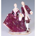 A 19TH CENTURY GERMAN NYMPHENBURG PORCELAIN FIGURE of a dancing couple, painted shield mark on front