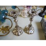 Pair of Silver plate on Copper Candlesticks of foliate design, 24cm in Height