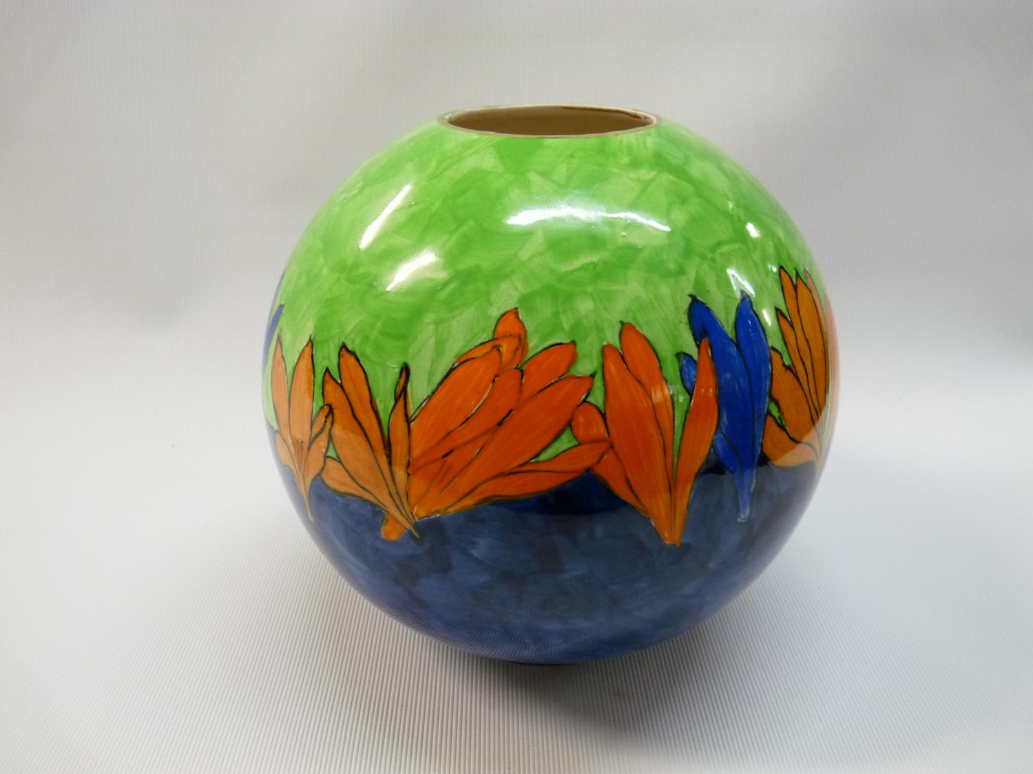 A J Wilkinson Spherical Crocus decorated vase of blue ground with stamped mark to base C.1930,