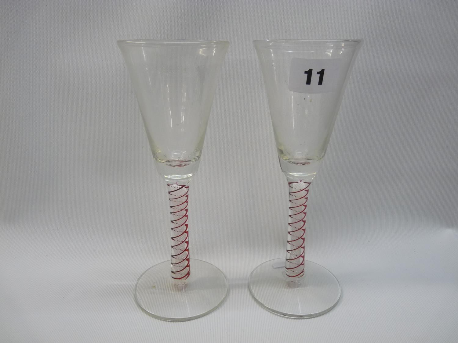 Pair of Georgian cordial glasses with conical-shaped bowl, opaque and ruby glass stem on splayed