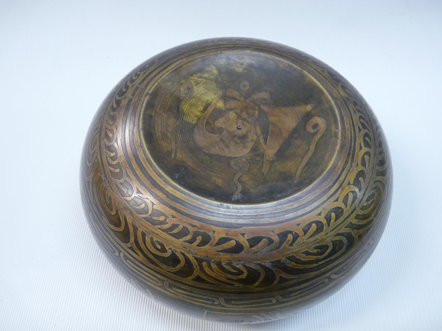 Late 19thC Tibetan Singing bowl with buddha relief decoration to interior, markings to base, 156cm - Image 2 of 2