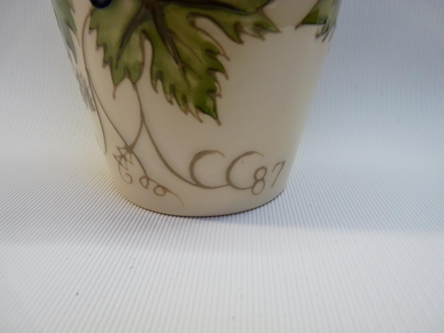 Moorcroft cream ground vase with Vine and Grape decoration marked CC 1987, impressed and stamped - Image 2 of 3