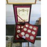 Cased Queen Elizabeth II 40th Silver Anniversary Coin collection comprising of 18 Silver Crowns