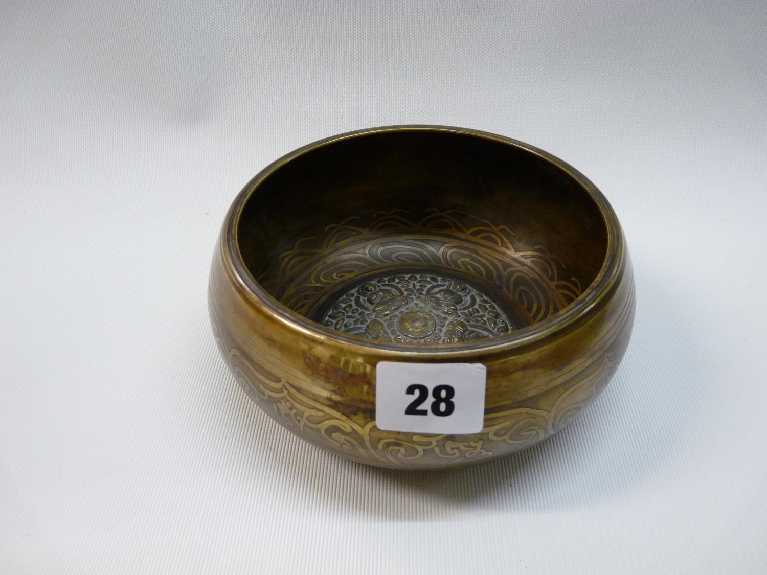 Late 19thC Tibetan Singing bowl with buddha relief decoration to interior, markings to base, 156cm