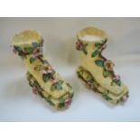 Pair of 19thC Floral encrusted Hanley of Staffordshire Bennington boots with underglaze marks to