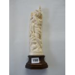 Good Quality Early 20thC Ivory carving of a figural group on wooden carved base, 31cm in Height