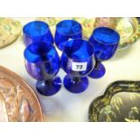 Set of 5 20thC Bristol Blue wine glasses with turned stems