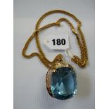 A Rare 366ct Cushion Cut Blue Topaz on 9ct Gold Claw mount and 9ct Gold fancy link chain, total