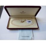 Cased set of Mikimoto of Japan Cultured Pearls with Yellow gold clasp