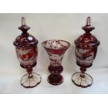 Pair of 19thC Bohemian Glass deep ruby toned lidded vases with etched frosted geometric banding at