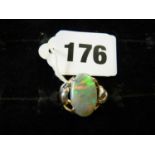 Interesting Ladies 18ct Gold Opal claw set ring flanked by white gold leaf design leaves 7.5g