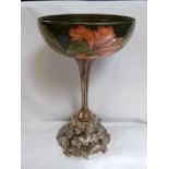 Moorcroft green glazed Lily Decorated bowl with ribbed interior, supported on a resin floral stem,