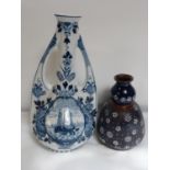 James Burrough Ltd of Lambeth Blue and White two handled decorative vase and a Lovatt Bombe vase