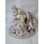 Samson figural group of a woman and 2 men in Regency clothing with floral and gilded detail. 20cm in