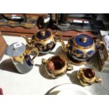 Albany & Harvey Potteries gilded Stork decorated part tea set on cobalt blue ground with stamped