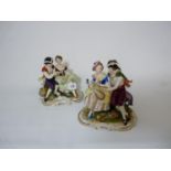 Pair of 20thC European figural groups with hand painted decoration on gilded bases by Rudolf